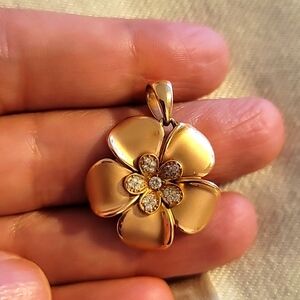 14K Yellow Gold Hawaiian Flower Diamond Pendant – New & Unworn.